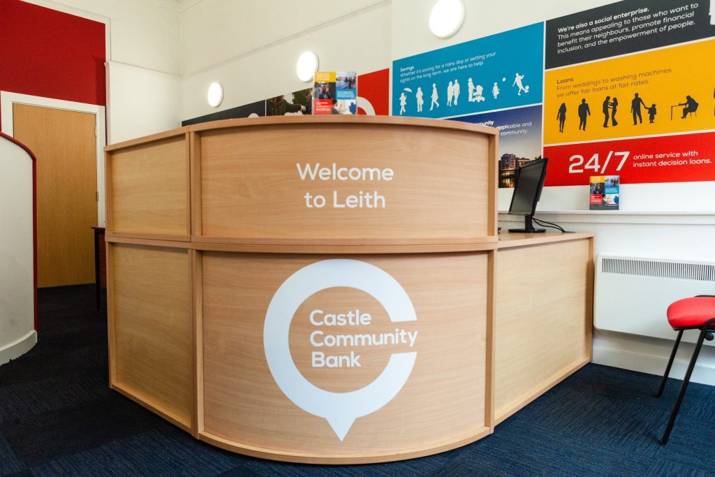 Inside of Leith Castle Community Bank branch. Photo shows front desk. 